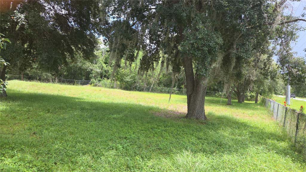 Photo of 9750 Ehren Cutoff, Land O Lakes, FL 34639 (MLS # TB8541216)