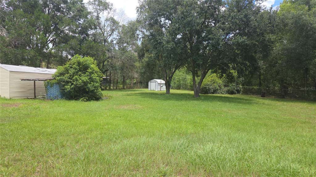 Photo of 9750 Ehren Cutoff, Land O Lakes, FL 34639 (MLS # TB8541216)