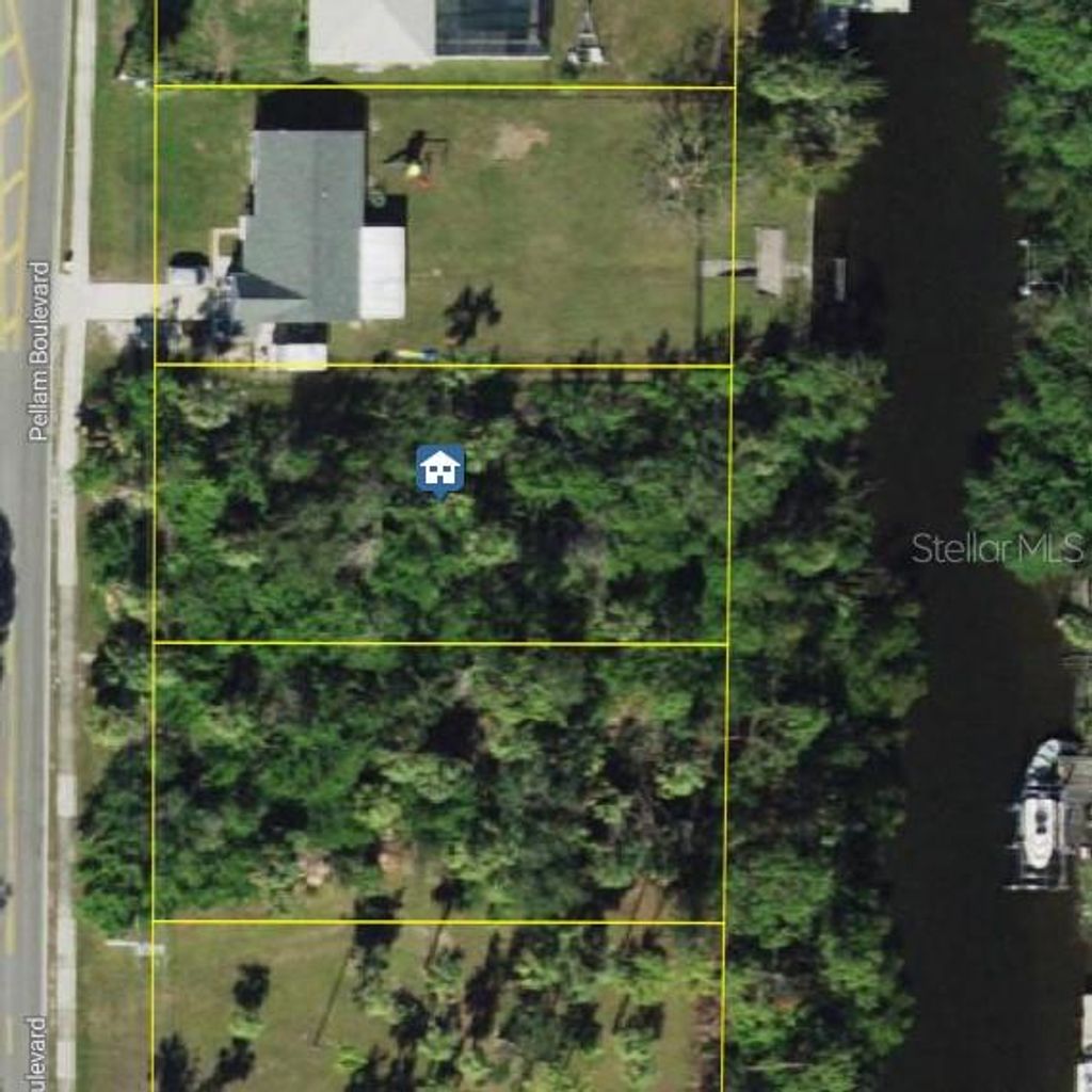 Photo of 2024 Pellam Boulevard, Port Charlotte, FL 33948 (MLS # C7510250)