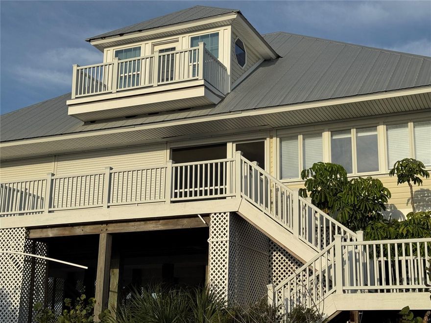 Island Home with Stunning Gulf and Beach Views Remodel Opportunity. Discover the potential of this island home offering breathtaking panoramic views of the Gulf waters and pristine beaches. Perfectly positioned to capture spectacular sunsets and coastal breezes, this property combines unmatched location with endless renovation possibilities. The residence features a spacious layout designed to highlight its incredible views. Expansive windows and sliding glass doors flood the interior with natural light and provide seamless indoor-outdoor living. Multiple bedrooms, generous living areas, and an oversized deck complete the perfect canvas for a custom coastal retreat. Located between Ft. Myers and Sarasota on Palm Island Resort. Enjoy a full schedule of resort activities; tennis, pickle ball, fitness classes or simple enjoy collecting shells and sunset photos. While the home is in need of remodeling, its structure and unbeatable setting make it an ideal investment for those seeking to design their dream beach house or vacation getaway. Enjoy direct access to island life— the sand, surf, and shoreline tranquility. This property is all about location, potential, and the promise of coastal living at its finest.
