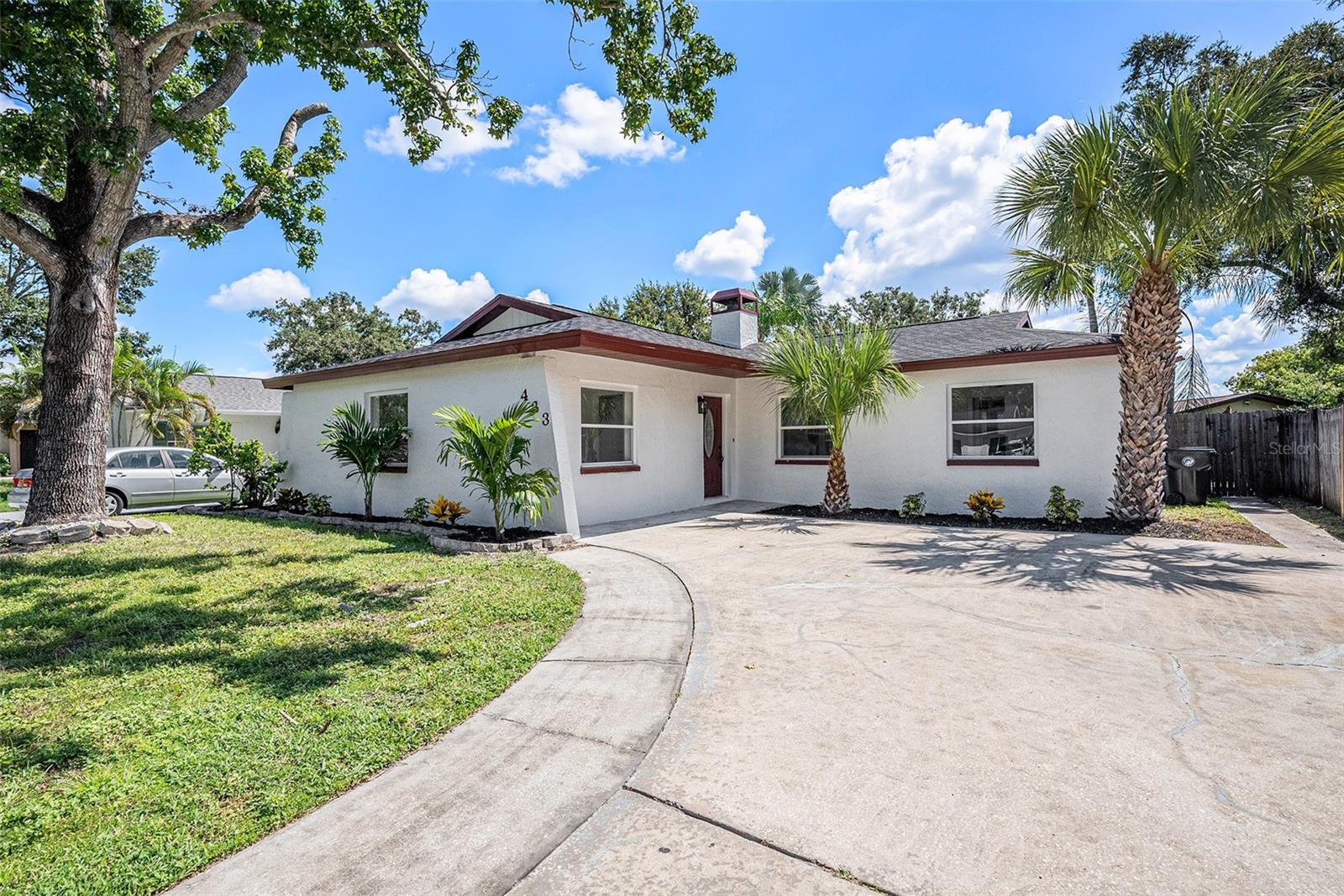 Charming single-story home located in the heart of Oldsmar, offering comfort and convenience. This property features a spacious open floor plan with abundant natural light throughout the living and dining areas. The kitchen is well-appointed with ample cabinet space and overlooks the main living area, perfect for everyday living and entertaining. The bedrooms are generously sized, and the primary suite includes a private bath. Outside, enjoy a large yard with mature landscaping that provides both privacy and outdoor enjoyment. Ideally situated near top-rated schools, parks, shopping, dining, and with easy access to Tampa, Clearwater, and the Gulf beaches.