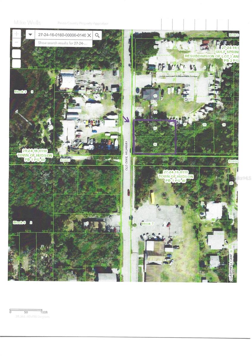 Vacant corner lot in beautiful Hudson, Florida! This property would be perfect to rezone and have your business on a main road.
