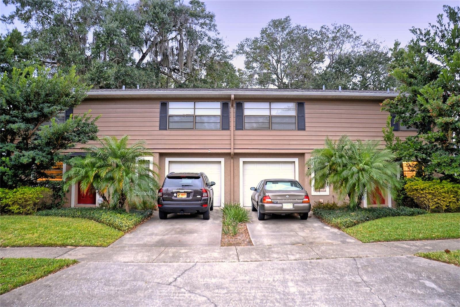 Located on a prominent oversized corner lot at Shine Avenue and Central Boulevard, just steps from the Thornton Park arts and entertainment district, this turn-key, income-producing duplex presents an exceptional opportunity for investors seeking both immediate cash flow and long-term value in the heart of Downtown Orlando. With walkable access to Lake Eola, dining, nightlife, and major employment hubs, the location alone makes this property a high-demand asset in a market where land value continues to climb. This property has maintained nearly 100% occupancy over the past decade, a testament to both tenant satisfaction and market desirability. High renewal rates and limited turnover have been fueled by a thoughtful design not commonly found in multifamily housing. Each unit includes a private, oversized, attached garage—offering rare convenience, added storage, enhanced privacy, and security. These features command a premium in rent and contribute to tenant longevity, reducing vacancy risk and maintenance cycles for the owner. Inside, each unit feels more like a single-family home than a rental. The first floor features a dedicated foyer entry, spacious living room, separate dining area, and a full-sized kitchen with an island, recessed lighting, and updated appliances including a refrigerator, range, dishwasher, and microwave. Private rear patios and covered porches extend the living space outdoors, while the full-size interior laundry rooms are consistently cited as a tenant favorite. Upstairs, the layout is intelligently designed as a split-bedroom plan, providing quiet and privacy between the two bedrooms. The 13’ x 16’ primary bedroom enjoys ensuite access to the full bath, while the 11’ x 16’ junior suite is positioned on the opposite side of the hallway, creating a flexible setup well-suited for roommates, families, or work-from-home needs. Ample closet space and natural light make the upper level just as comfortable as it is functional. Both units have seen significant improvements over the past several years. Kitchens in both units have been fully renovated with electrical updates and new appliances. 2 N Shine underwent a complete bathroom remodel, while 4 N Shine received substantial upgrades. Additional improvements include full interior repainting, new flooring in various areas, new garage door openers, and new in-unit washers and dryers. Stabilized and cash flowing, both units are under lease—one through November 2025 and the other through March 2026—providing predictable income with no immediate turnover risk. This level of condition, location, and occupancy is nearly impossible to replicate in today’s urban core, especially with such low owner responsibilities and minimal deferred maintenance. Whether you’re a buy-and-hold investor seeking appreciation in one of Central Florida’s fastest-growing neighborhoods, or a portfolio builder looking for reliable income and low tenant churn, this downtown Orlando duplex offers a rare combination of quality, performance, and future upside.