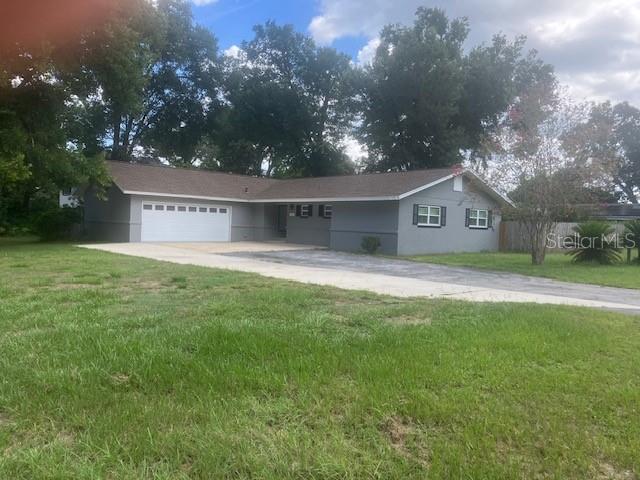 Nice Ocala neighborhood on corner lot move in ready, 3Bed 2bath, Fireplace in Family room, New paint in & out, New Water Heater, Florida room, Totally fenced in, 2 car garage, Roof is 9 years old and in excellent condition!!!