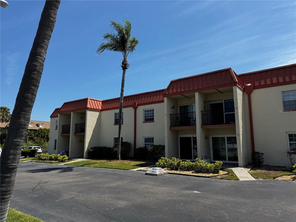 Photo of 10365 Paradise Boulevard #9, Treasure Island, FL 33706 (MLS # TB8501562)