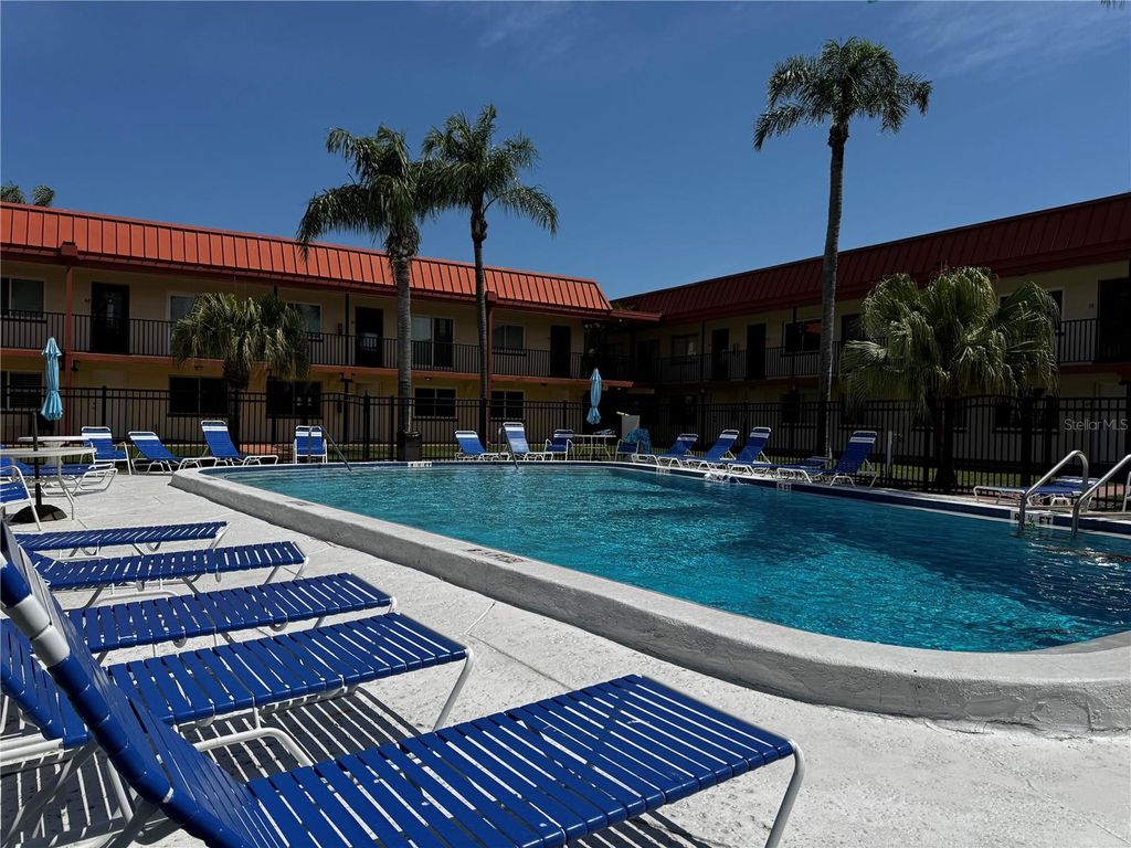 Photo of 10365 Paradise Boulevard #9, Treasure Island, FL 33706 (MLS # TB8501562)