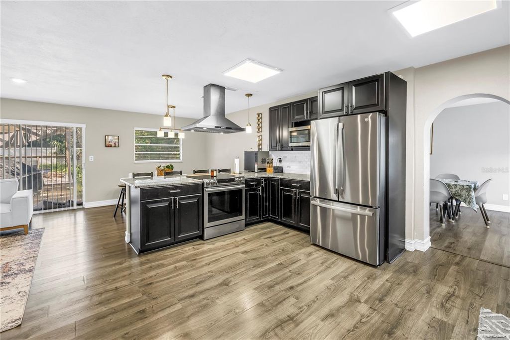 Photo of 4708 W Coachman Avenue, Tampa, FL 33611 (MLS # TB8413243)