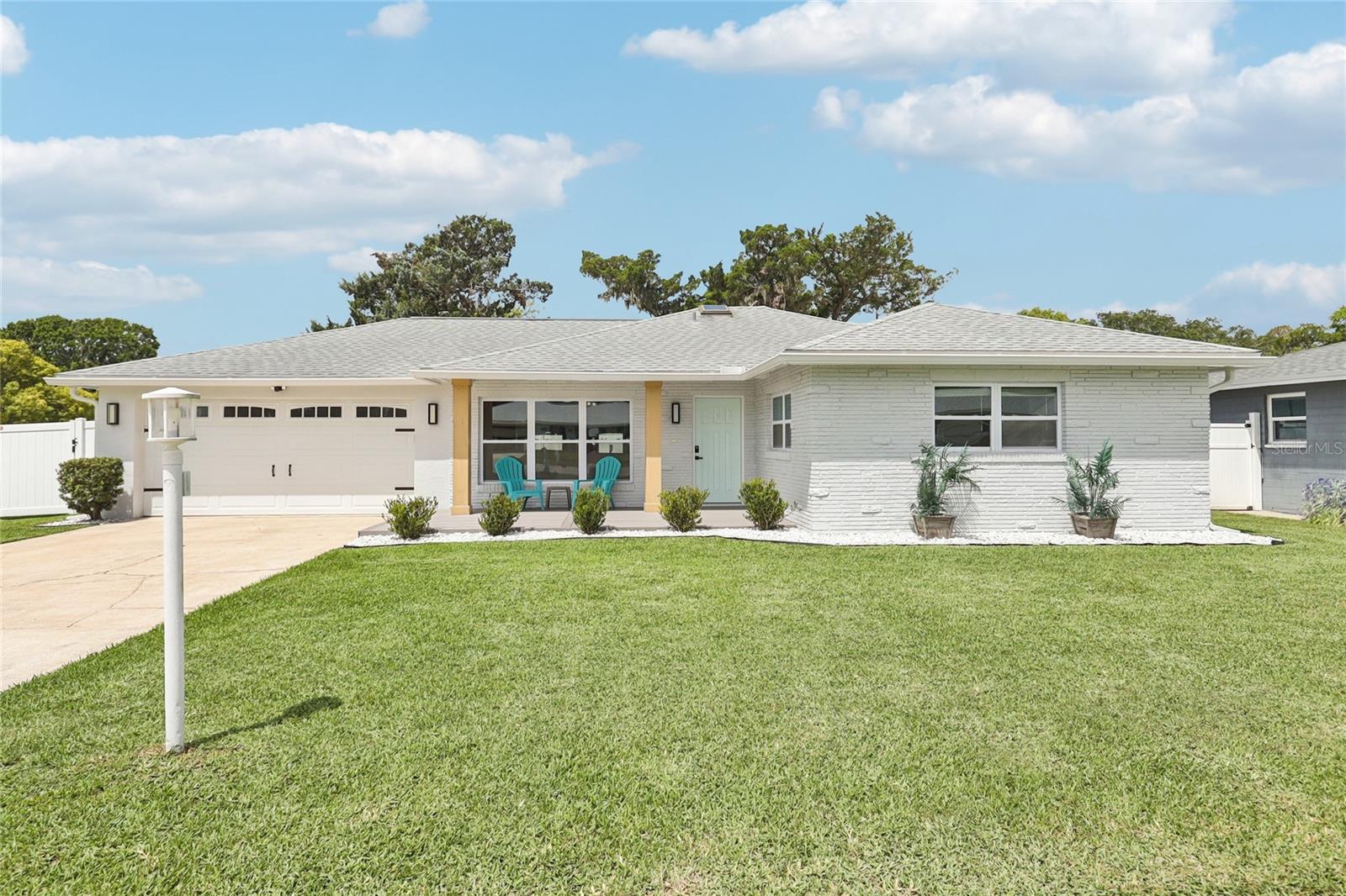 The one you have been waiting for! Located in South Daytona, just minutes south of the world-famous Daytona Beach, shopping, dining, and so much more. The property sits on a 8,498 sq ft corner lot, with no rear neighbors! The main residence is an updated 3-bedroom 2 -bathroom with 1508 sq ft of living space. Through the front door of the main residence, you welcomed with the coastal themed living with an open and airy floor plan that greets you bursting with natural light onto the new tile floors. Two large living areas that are ideal for everyday living and family gatherings.The kitchen is equipped with new granite countertops, tile backsplash, new cabinets with pull out drawers for extra convenience, and a separate wine bar area and updated appliances. Additionally, beautiful glass cabinets are perfect for showcasing glassware or fine China. The renovated master bedroom boasts a large bathroom with ample storage and countertop space for all your needs! All bedrooms are well-proportioned with comfort in mind. The new front patio deck with Trek flooring is the perfect spot for your morning coffee in the amazing Florida weather. Out back, the updated back patio with a large concrete area is spacious enough for all your outdoor furniture and perfect place for hosting your next BBQ. The property includes a large, fenced yard for privacy and security. Main residence updates include: new water heater (2025), A/C (2018), roof (2018), all new appliances, hurricane impact windows throughout the entire residence (2019), new exterior steel doors (2025), seamless gutters (2024)No HOA in a well-maintained neighborhood perfect for the family. Don't miss out on this fantastic opportunity!