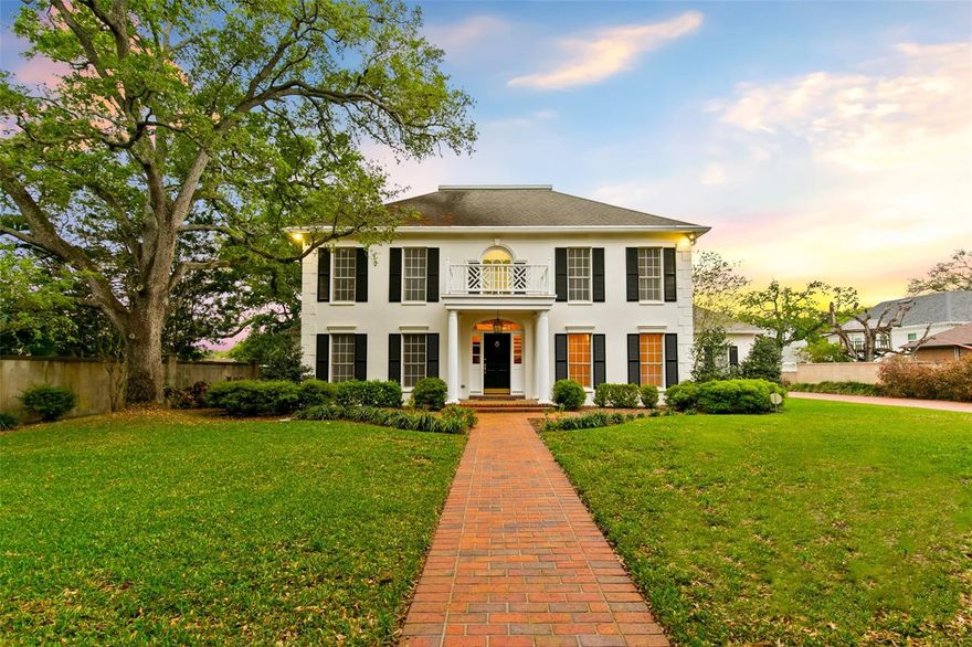 Discover the charm of this stunning Georgian Style Estate nestled in Bayshore Beautiful South Tampa neighborhood, steps away from Bayshore Blvd, the longest waterfront sidewalk. This home boasts unparalleled privacy on an off-street elevated 110" x 215" lot with its private 20’x132’ brick driveway that takes you to a tranquil cul-de-sac ensconced by a tree in the middle. This Traditional Georgian Center Hall layout, featuring generously proportioned rooms and Hatco engineered commercial grade hardwood oak flooring. Impeccable wood detailing, including door moldings, chair rails, baseboards, and wainscot, adds a touch of sophistication. The chef’s kitchen, complete with granite countertops, stainless appliances, and double convection ovens, beckons culinary enthusiasts. An expansive covered back porch overlooks the sprawling walled back yard, offering a picturesque setting for relaxation. Car enthusiasts will appreciate the oversized garage accommodating 2/3 cars, equipped with a new insulated stormproof garage door and opener, complemented by a separate work area. The residence is adorned with double pane insulated windows and custom wood raised panel shutters, ensuring both elegance and functionality. Outdoor space in the back of the house has a nice brick and grass covered porch, perfect for various outdoor activities. Upgrades include new paint, an 80-gallon hybrid heat pump water heater, Bosch dishwasher, and more. Boasting a high first-floor elevation and situated in an X Flood Zone, this home prioritizes safety and convenience. Moreover, the property features a sprinkler system on a separate meter, monitored hard-wired fire and alarm systems, and Arlo smart wireless exterior security cameras. Enhanced by mature landscaping and Charleston style concrete stucco exterior walls, this home offers a unique blend of privacy and elegance. With potential for expansion or new construction (8000-10000sf), this is a rare opportunity in South Tampa. Schedule your private showing today to experience this exclusive South Tampa Estate.