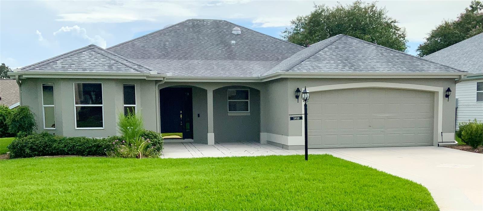 Professional Photos coming soon. Exceptional 3 bedroom 2 bathroom DESIGNER Vera Cruz model home. No Bond. Walk up the premium epoxy driveway to the cozy front porch. Enter through the front door with side light which adds natural lighting. Inside you will find a large foyer with crown molding and a closet for extra storage. Crown molding in the dining room/living room area too! Large kitchen with Bay windows off the nook adds more space. Stainless Stove, Fridge and Microwave. Neutral tumbled marble back splash. Pull outs in the large kitchen pantry. Laundry room features storage cabinets above and utility sink. Formal Dining room and Living Room combination makes it feel open. Split bedrooms for privacy. Solar tube added in Living Room for added light. 8 foot door wall leads to screened, partially covered lanai under roof with extended screened private area. Large Main Bedroom with Ensuite bath and 2 walk in closets. Dual sinks in main bath and makeup vanity space. Pocket door to shower area. Two bedrooms with guest bathroom Tub/Shower combination. Street is a Cul de Sac location with limited traffic in this very quiet neighborhood. Near 2 town squares, Spanich springs and Lake Sumter. 4 or 5 min walk to Tierra Del Sol Country Club, recreation/pool and Restaurant. Close to De La Vista Executive Golf Course and 12 others. Come Join this terrific neighborhood and start living the dream. Shopping, Restaurants and Entertainment, Health Care, Golf, are all nearby. Roof December 2017, Newer HVAC 07/2020 and newer Hot water Tank. This home will move quick