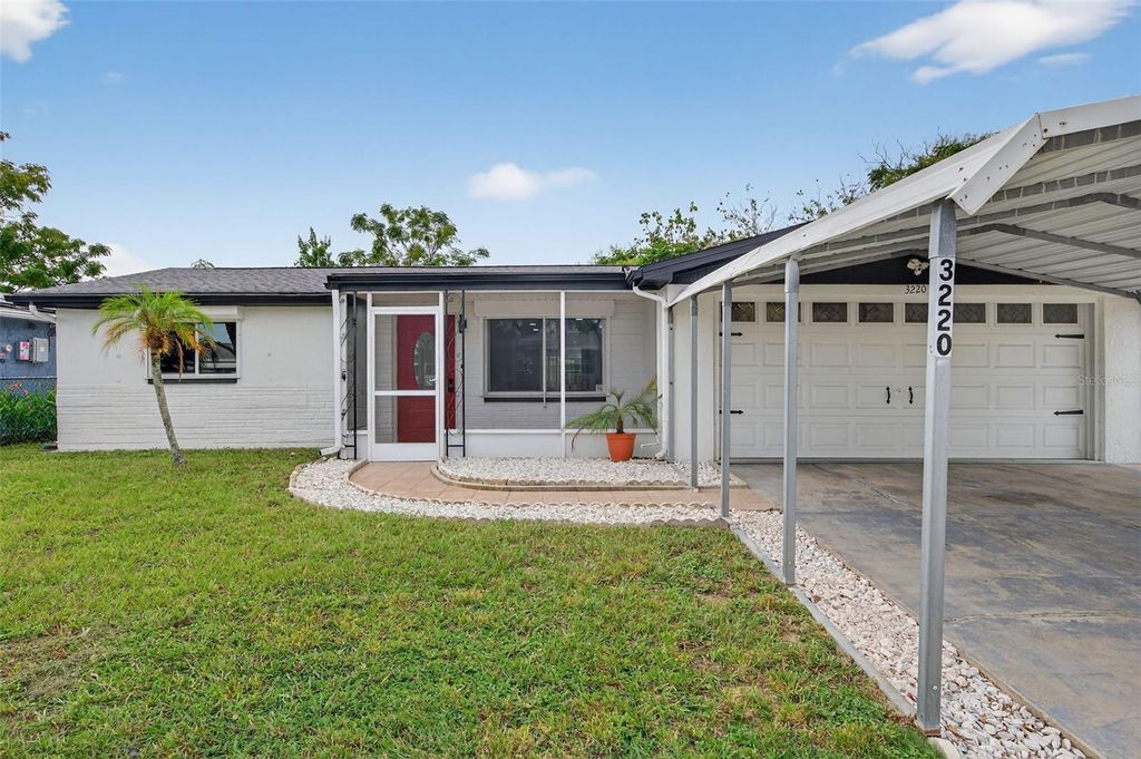 Photo of 3220 Fairmount Drive, Holiday, FL 34691 (MLS # TB8431248)