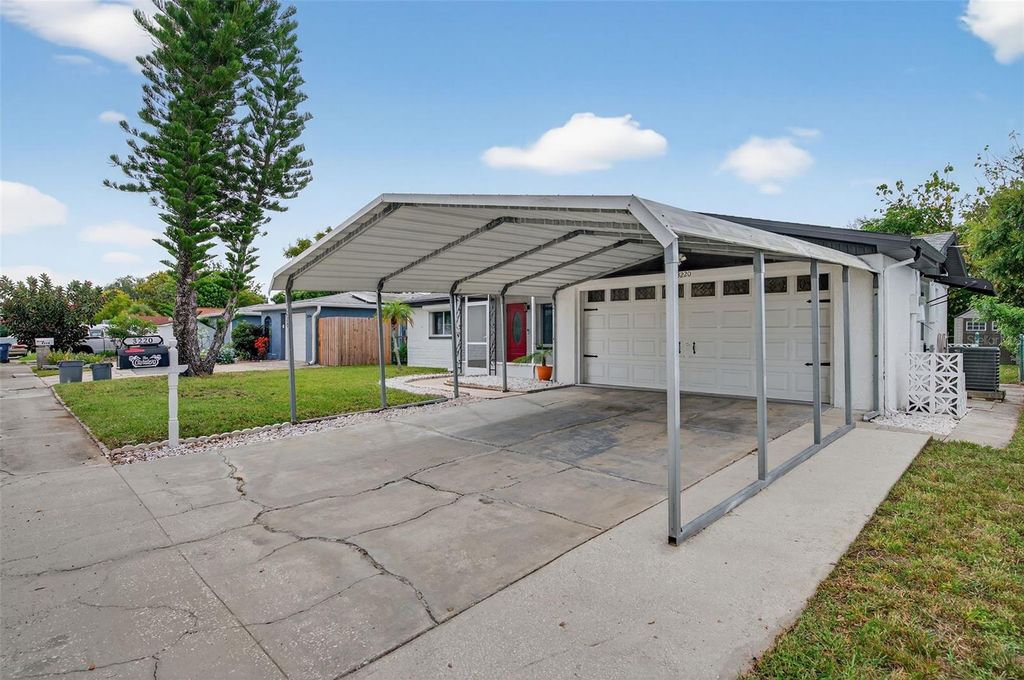 Photo of 3220 Fairmount Drive, Holiday, FL 34691 (MLS # TB8431248)