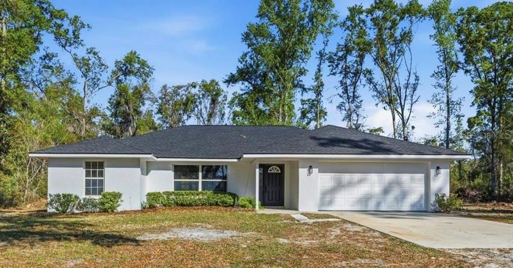 Photo of 957 NE 354th Avenue, Old Town, FL 32680 (MLS # GC538851)
