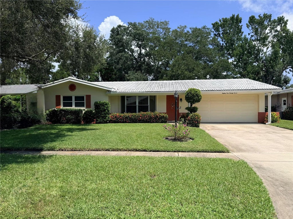 Photo of 8927 Lakewood Drive, Seminole, FL 33772 (MLS # TB8539211)