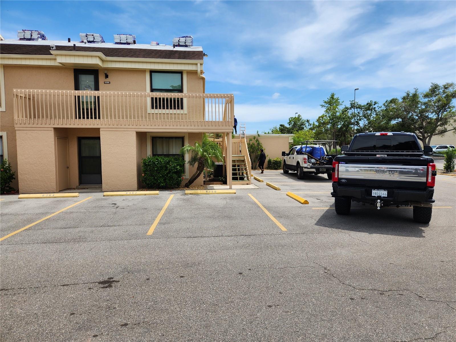 Don't miss this bright and spacious 3 bedroom 2 bath 2nd floor end unit condo with a view of the pool from the balcony. Centrally located just minutes from the beaches of Anna Maria Island and Siesta Key. Located close to stores and restaurants. Hospital is also nearby. Property includes 2 pools, water, sewer, cable, trash! New roof being installed today 7-10-2025! Beautiful waterproof wood laminate flooring throughout with very pretty barn doors leading to the master bath make this roomy split plan condo easy to maintain and will be an excellent home or rental.. Newer high impact sliding doors to an outdoor carpeted balcony. Front door can be opened to allow more light through a glass storm door. Small storage unit comes with this condo and is located under the unit located to the right of the downstairs unit. This condo is ready for a new owner. Call today for your private tour!