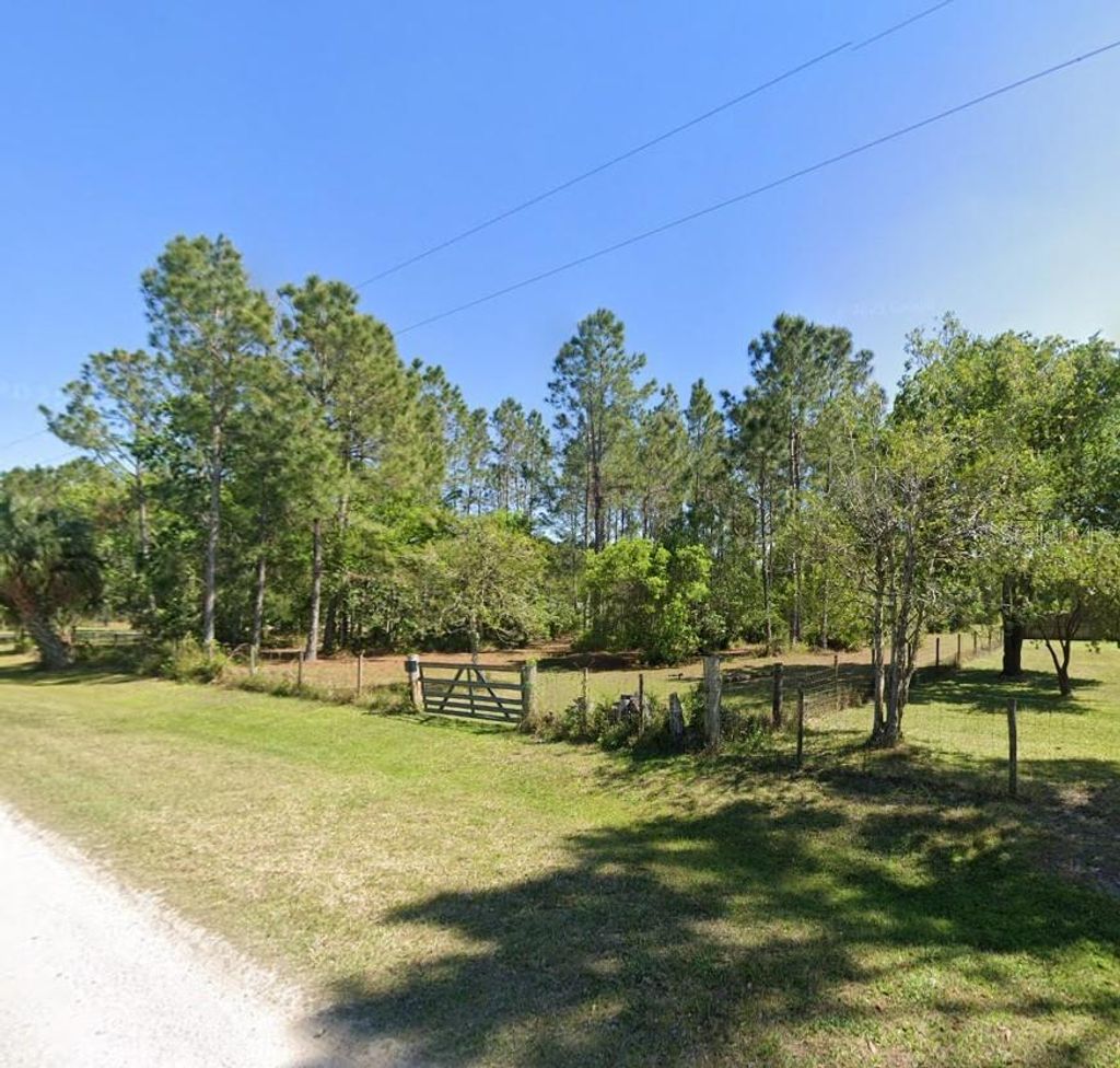 Photo of 26300 Pheasant Run, Wesley Chapel, FL 33544 (MLS # O6341052)
