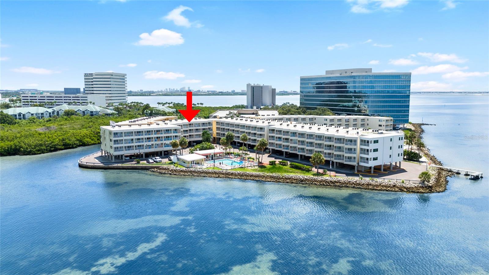 Waterfront Condo with Investment Potential in Tampa’s Sailport Waterfront Suites. Discover a rare opportunity to own a fully furnished 1-bedroom, 1-bathroom unit in Tampa’s only waterfront condo-hotel. Located on the fourth floor of Sailport Waterfront Suites, this turn-key condo offers stunning water views and unforgettable sunsets, making it a sought-after destination for both vacationers and business travelers. The unit has a strong income-producing history, appealing to savvy investors looking to expand their portfolio or those seeking a dual-purpose vacation home. Sailport Waterfront Suites is ideally situated just minutes from Downtown Tampa, Tampa International Airport, and some of Florida’s most beautiful beaches, including Ben T. Davis, Clearwater, and St. Pete. With year-round rental demand and on-site property management, owning and managing this investment is simple and stress-free. Historical income and occupancy reports are available upon request, offering added transparency for serious buyers. Residents and guests enjoy access to a wide array of resort-style amenities, including a heated waterfront pool, private sandy beach, fitness island, on-site restaurant and tiki bar, fire pit, BBQ grills, conference room, covered parking, laundry facilities, 24/7 gated security, a convenient mini-mart, and more. HOA dues include insurance, adding even more value to this unique offering. Located only 10 minutes from the airport, 15 minutes from Downtown Tampa, and within 30 to 40 minutes of Clearwater and St. Pete beaches, this property offers the perfect blend of luxury, convenience, and income potential. Whether you're looking to invest or unwind, this waterfront condo delivers. Schedule your private showing today and claim your own slice of paradise.
