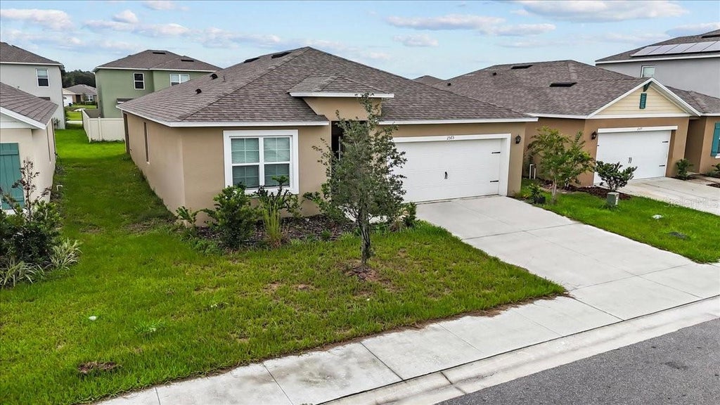 Photo of 2573 Trinidad Road, Haines City, FL 33844 (MLS # O6447608)