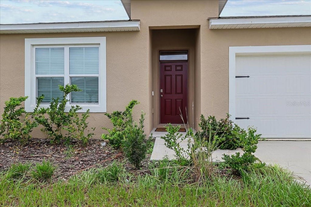 Photo of 2573 Trinidad Road, Haines City, FL 33844 (MLS # O6447608)
