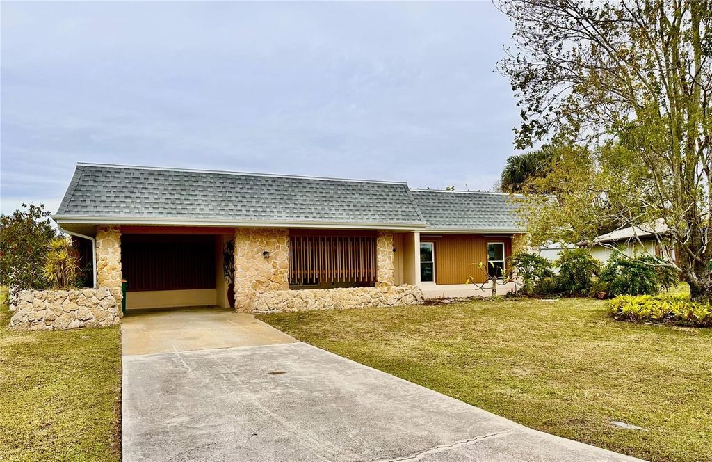 Photo of 1385 Harmony Drive, Port Charlotte, FL 33952 (MLS # TB8496696)