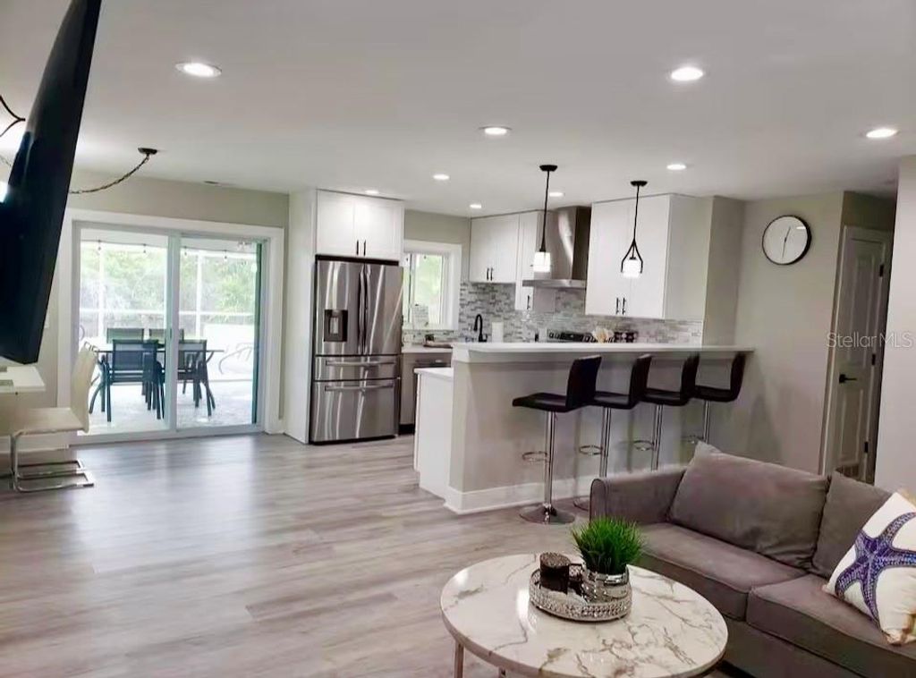 Photo of 1385 Harmony Drive, Port Charlotte, FL 33952 (MLS # TB8496696)