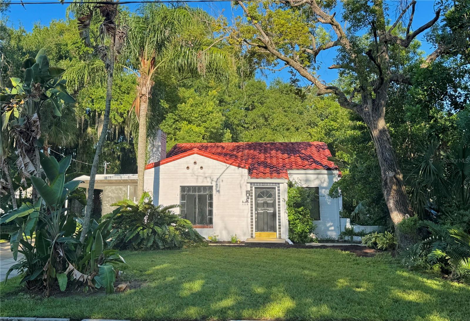 Authentic “Old Florida” vintage art deco home in downtown Delaney Park. Open floor plan with high ceilings. Beautiful custom inlaid terrazo floors. Original sconces in living and bedrooms. Brand new kitchen and all new appliances. One bathroom is brand new with step down shower and floating cabinet. Second bathroom is vintage with original black&white tile. Main house has additonal storage and closet space. House is setback on a large lot with mature trees and landscaping. Recently refurbished detached building lends itself to being ready to make additional income property/studio/office. Close to all major roads, airport, and hospitals.