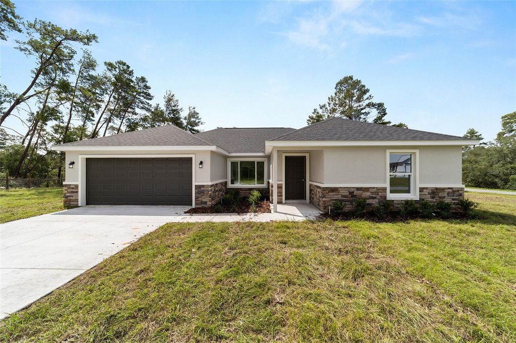 Photo of 13103 NE 7th Loop, Silver Springs, FL 34488 (MLS # O6354144)