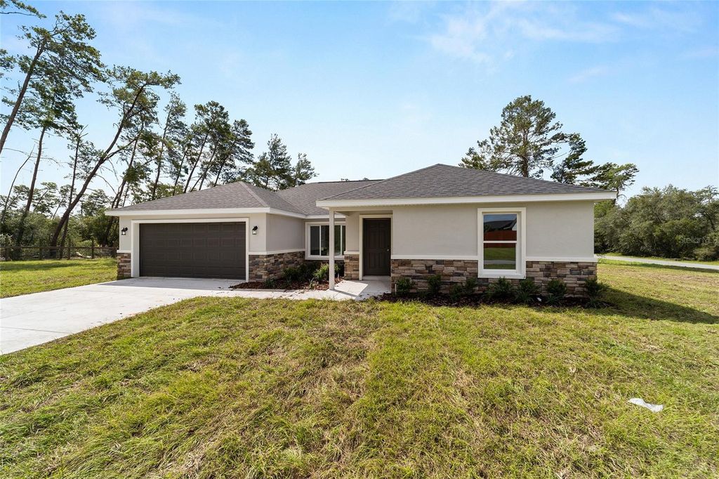 Photo of 13103 NE 7th Loop, Silver Springs, FL 34488 (MLS # O6354144)