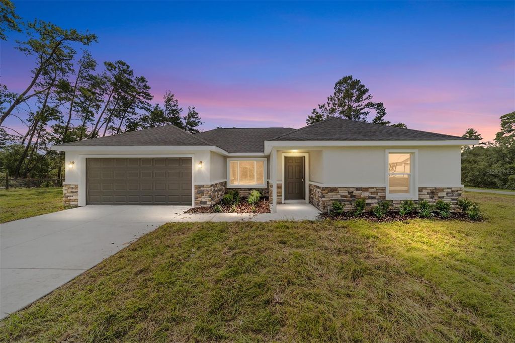 Photo of 13103 NE 7th Loop, Silver Springs, FL 34488 (MLS # O6354144)