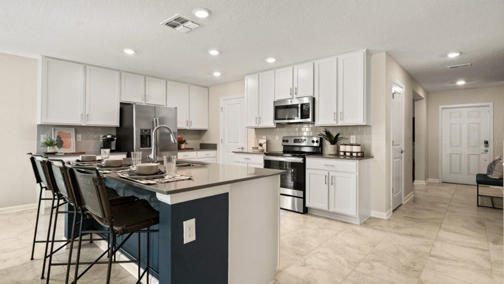 Photo of 5174 Worchester Drive, Kissimmee, FL 34746 (MLS # O6445472)