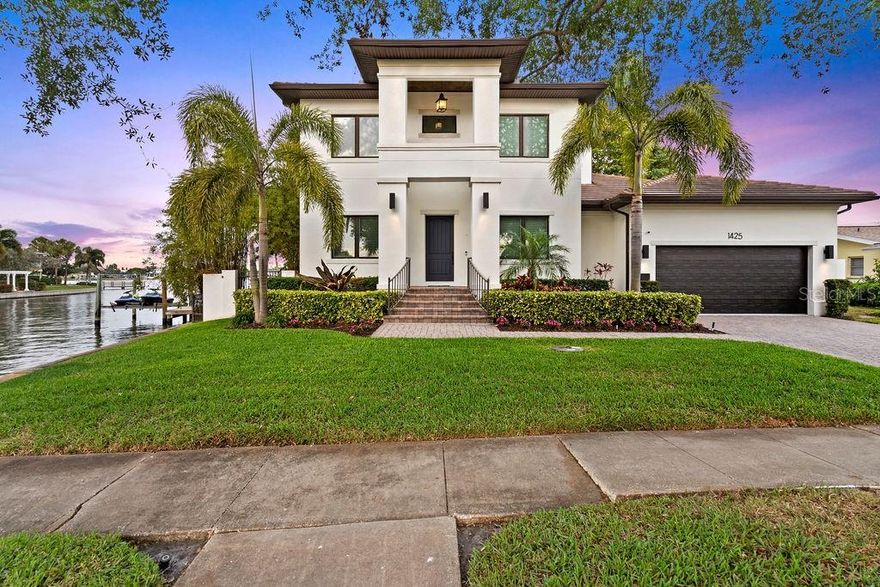 This is your opportunity to own an extraordinary custom built home on an oversized waterfront corner lot in Snell Isle - one of the most sought after neighborhoods in St. Petersburg. This ALL BLOCK CONSTRUCTION home offers expansive views of the water giving you both privacy and a secluded feel. As you enter through the grand entrance of the home you will find yourself in the foyer which features a study/office space to the left and a formal dining room to the right. Upon walking further through the home you will find a powder room followed by the living room and kitchen. The chef's kitchen is truly the heart of the home offering the perfect opportunity for entertaining friends, family, & guests. The kitchen features hardwood soft close cabinets, an oversized kitchen island, Cambria Quartz countertops, pot filler, and a 6 burner Viking range, that perfectly compliments the rest of the stainless steel Viking appliances. The kitchen also features a butlers pantry with a wine cooler & a spacious pantry. Enjoy your mornings drinking your coffee in your breakfast nook that overlooks the beautiful Bayou. Off of the living room you will discover a covered porch which hosts a custom outdoor kitchen where you can sit and enjoy the view while you grill your dinner. The first level bedroom has a built in murphy bed as well as an en-suite bath with access to the yard. Upstairs you will find the expansive owners' retreat overlooking the water where you can enjoy your morning cup of coffee as you watch the sunrise, or a delightful glass of wine in the evening as you watch the sun set. The primary bedroom features an en-suite with a double vanity, expansive shower, a relaxing soaking tub, & 2 sizable walk in closets. Up stairs you will also find two additional guest bedrooms which share a jack-and-jill bath, as well as a laundry room with ample storage. Additional noteworthy features include: one brand new AC (2023), tankless hot water heater, in ground propane tank, new carpeting in upstairs bedrooms & primary closets, new interior paint, fresh landscaping, handicap lift in the garage, Nest thermostats, & Ring doorbell. Walk or bike ride to Vinoy Golf Club, Coffee Pot Bayou, and Downtown St. Pete. Just a short drive to top Florida beaches, Clearwater, Tampa, & Tampa International Airport. Don’t miss this opportunity & let the breathtaking water views get away! Schedule a showing today.