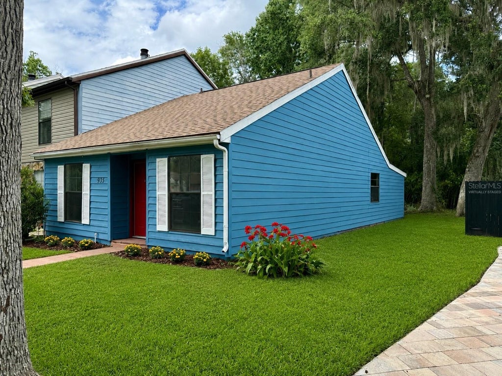 Photo of 935 Village Drive, Brooksville, FL 34601 (MLS # W7886254)
