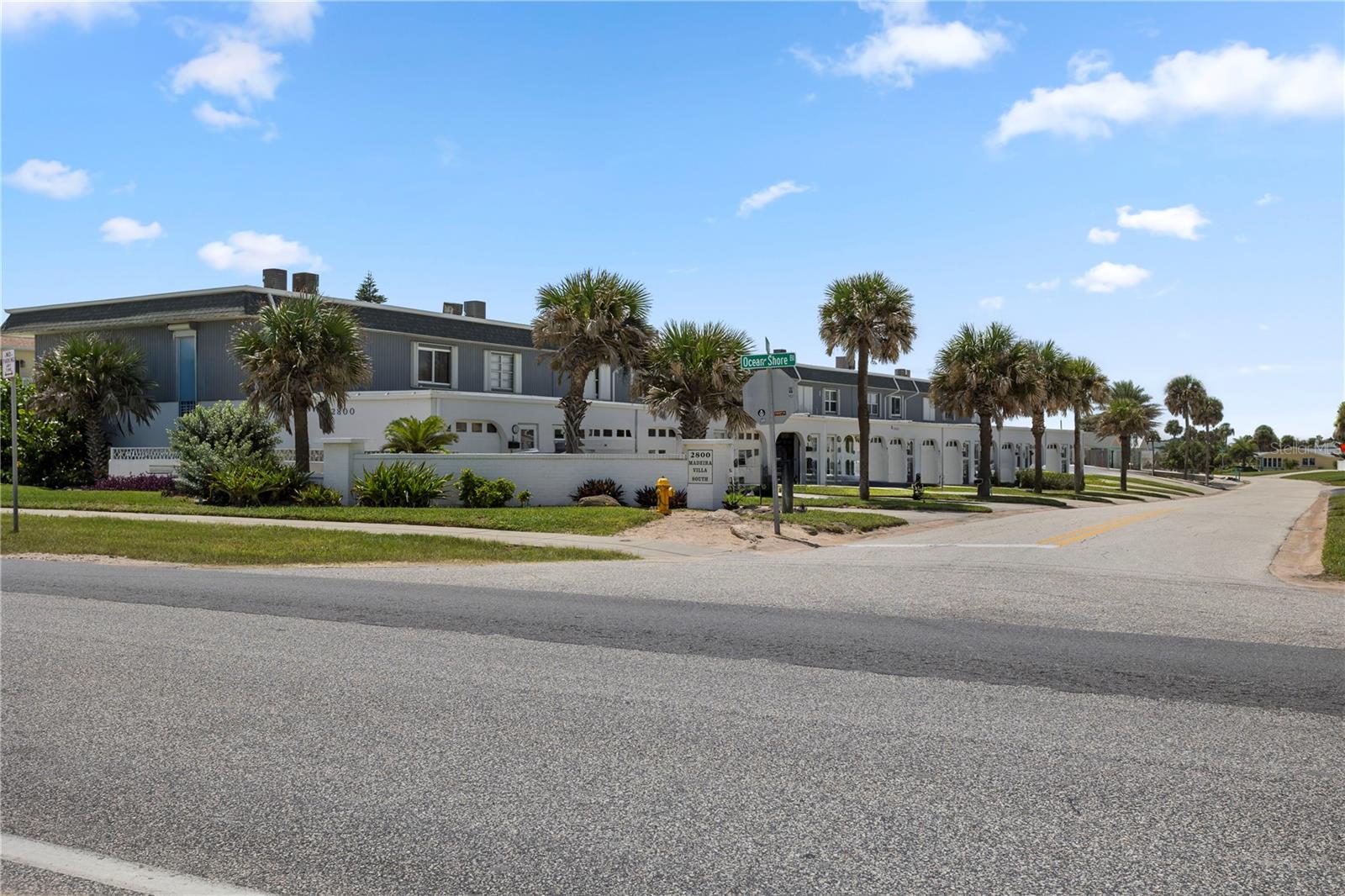 Step into coastal living at its best! Less than 150 feet to AIA and the beach, with nothing between your building and the beach and a nearby beach walkover, this beautifully updated home captures ocean views from both upstairs bedrooms. One bedroom offers a private balcony and large double closet, making it the perfect spot to wake up with the sunrise. Both baths have been updated. A full bath with a shower/tub combo serves the upstairs, while a second full bath with an upgraded shower is conveniently located downstairs. The custom kitchen is designed for entertaining with granite tiled countertops, stainless steel appliances, a tile backsplash, and an inviting eat-in bar. Tile floors flow through the downstairs for easy care, while the upstairs is finished with warm laminate flooring. A rare garage with attached driveway provides plenty of space for two to three cars, bikes, and beach gear, and hurricane-rated shutters on all windows and sliding doors and updated windows and sliders give added security and peace of mind. Offered fully furnishedincluding artwork, furniture, kitchenware, linens, and garage contentsthis home is truly move-in ready. Major updates include a new roof (2022), A/C condenser (2023), and air handler (2018) new garage door and opener (2025). Whether you're looking for a full-time residence, a vacation getaway, or an investment, this ocean-view home delivers the perfect blend of comfort, convenience, and beachside lifestyle. Minimum 30 day rentals allowed; 2 pets under 25 lbs allowed. By appointment only; call today!