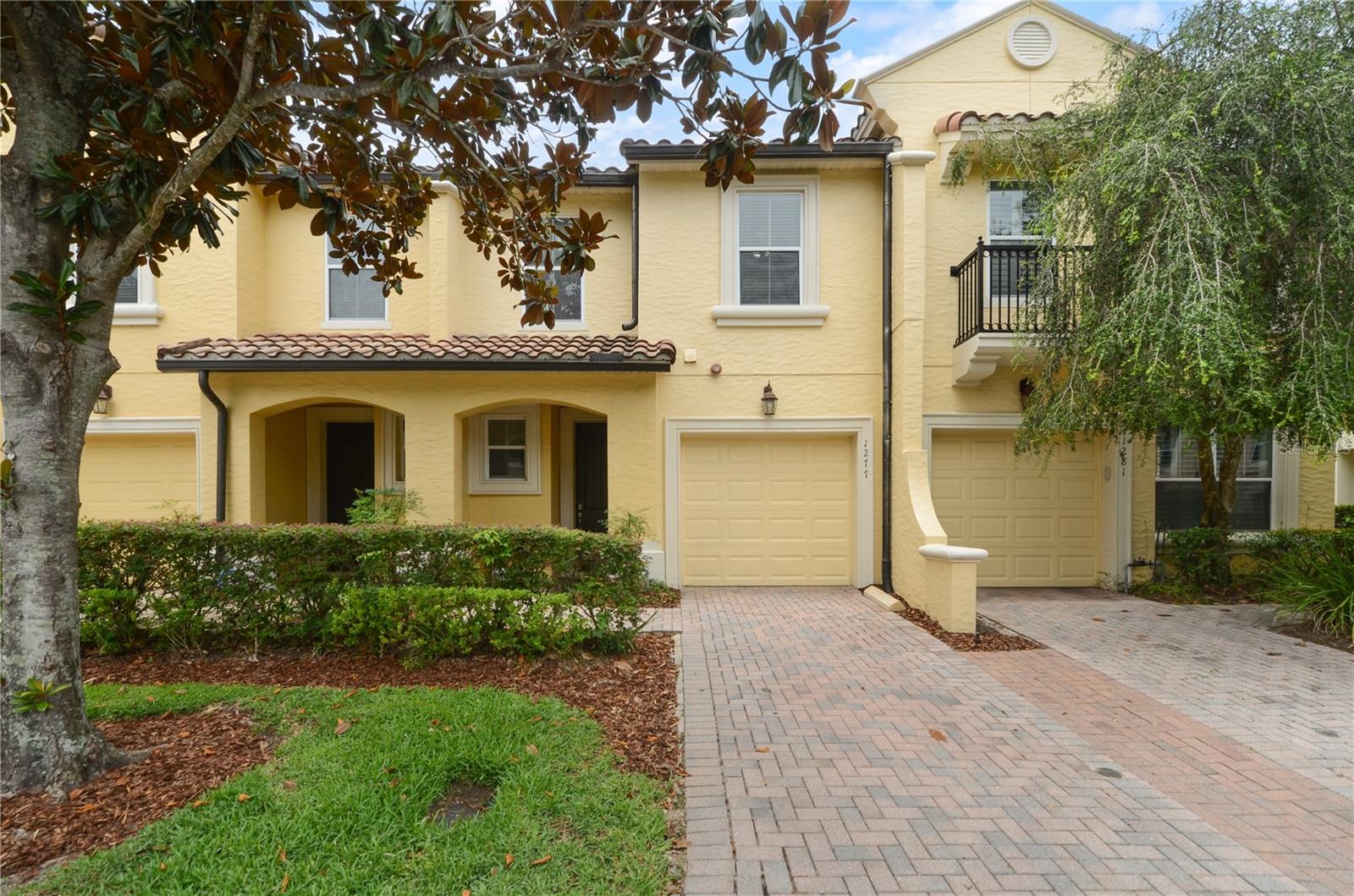 This is a well-located townhome in the gated community of Montacino. The unit has been refreshed with new paint throughout, along with new luxury vinyl on the second floor. The downstairs works well for entertaining with an open floor plan featuring Living, Kitchen & Dining areas. There is a nice-size covered rear porch just off the kitchen that faces a shady and treed green space to be enjoyed. There is also an upstairs rear balcony off of the primary bedroom that is sure to impress. The laundry is smartly located upstairs, along with a second bathroom, as well as the second and third bedrooms. This unit offers a short walk to the nicely planned pool area as well as enjoyable strolls on the sidewalk along Lake Charity.