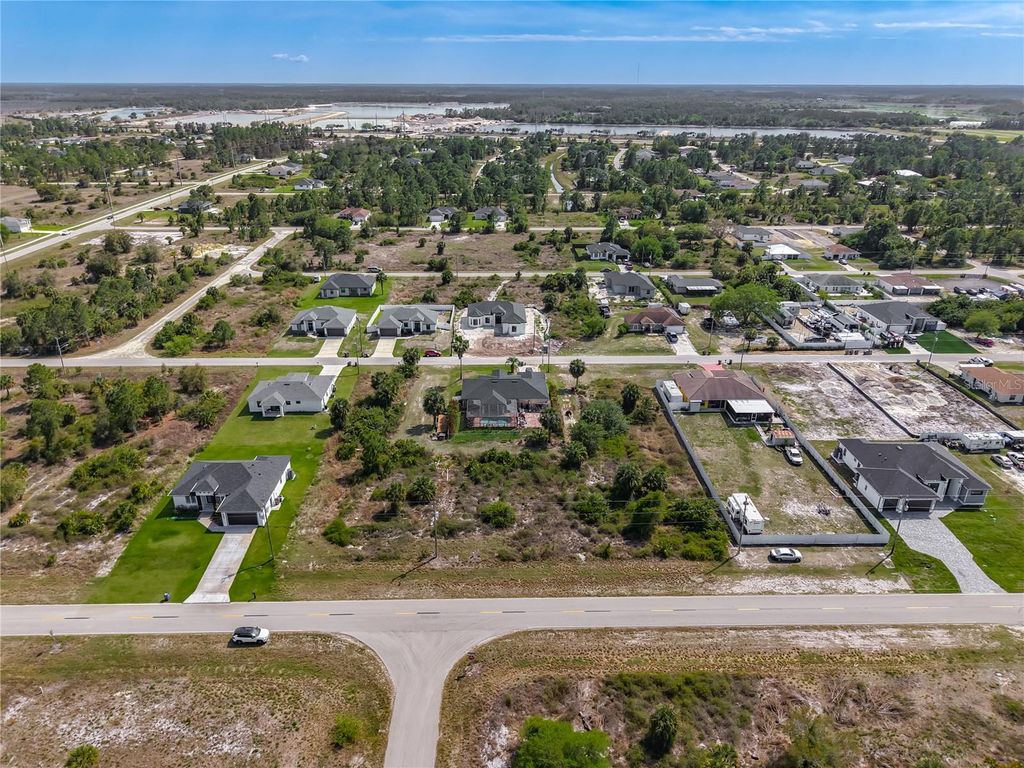 Photo of 750 Nimitz Blvd, Lehigh Acres, FL 33974 (MLS # S5146465)