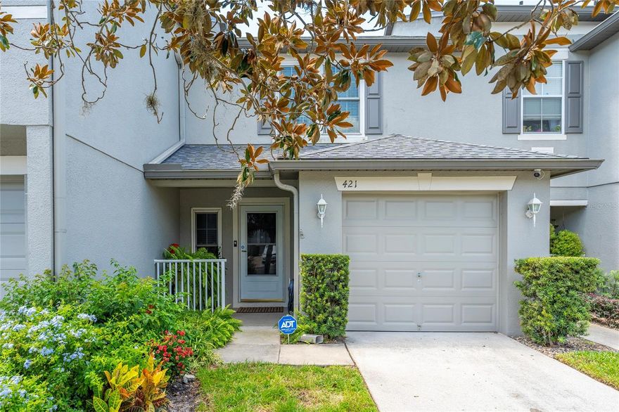Welcome to 421 Tradition Lane in Winter Springs! This beautiful TownHouse with 2 bedrooms and 2.5 bathrooms is perfect for those looking for a comfortable and well-located home. There is no carpet anywhere, as the house features wood flooring throughout and ceramic tile in the wet areas, making it easy to clean and maintain.Featuring double pane windows for enhanced energy efficiency and comfort. The primary bedroom includes a Walk-In closet with natural light, thanks to a window that lets the sunlight in. The kitchen is fully equipped with all appliances, and the washer and dryer are conveniently located on the second floor. The community is gated, providing extra peace of mind and security for your family, access to a community pool and playground for added enjoyment  Additionally, it is located in an excellent school district, which includes Layer Elementary, India Trails Middle School, and Winter Springs High School. The location is ideal, being only 20 minutes from UCF (University of Central Florida) and about 30 minutes from Orlando International Airport. It is also close to shops, restaurants, and parks, with easy access to major roads. This TownHouse is move-in ready and waiting for you to make it your home. Schedule your visit today!