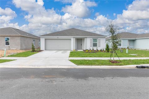 Photo of 304 Towns Circle, Haines City, FL 33844 (MLS # O6373159)