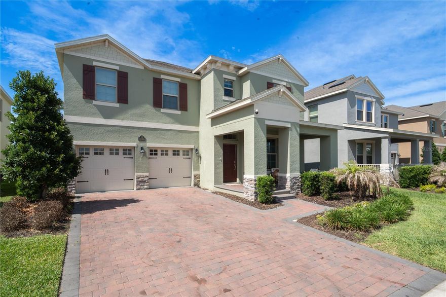 Here’s a polished luxury style Zillow/MLS property description you can use:

Welcome to this stunning waterfront residence located in one of Winter Garden’s most desirable communities. Situated on the largest lot in the neighborhood, this exceptional five bedroom home combines luxury, comfort, and modern design with breathtaking water views throughout the property.

From the moment you enter, you are greeted by elegant custom finishes including designer wood wall panels, custom TV feature walls, integrated LED lighting, and high end details thoughtfully curated throughout the home. The spacious open concept layout creates the perfect atmosphere for both entertaining and everyday living.

The gourmet kitchen overlooks the living room and offers beautiful panoramic water views, creating a bright and inviting space at the heart of the home. Large windows fill the property with natural light while seamlessly connecting the indoor and outdoor living experience.

Upstairs, you will find a spacious media and TV room perfect for family gatherings, movie nights, or a private retreat. Adding a unique architectural touch, several bedroom entrances feature hidden doors that blend beautifully into the custom wall panel designs.

Step outside to an oversized backyard with direct water views and a naturally sloped lot descending toward the water, creating the ideal setting for a future infinity edge pool and luxury outdoor oasis. The expansive outdoor space offers endless possibilities for entertaining, relaxation, and enjoying Florida living at its finest.

This is a rare opportunity to own one of the most unique and upgraded homes in the community, offering premium lot positioning, designer upgrades, and incredible potential for outdoor expansion.