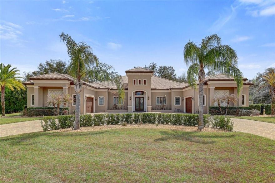 APPROX. 1.2 ACRES!!!6 BEDROOM 5 FULL BATH!!!, 4 CAR GARAGE!!!, OVERSIZED SCREENED IN BEAUTIFUL POOL AND DECK AREA,!!!! TURF SOCCER TRAINING AREA!!!, BASKETBALL COURT!!!
-Welcome to an extraordinary single-story luxury estate offering approximately 5,000 square feet of refined living on a private 1.2-acre homesite in the exclusive gated community of The Sanctuary. Built with solid poured concrete construction and a timeless tile roof, this exceptional residence blends durability, elegance, and resort-style amenities rarely found in one property. From the moment you arrive, the expansive paver driveway and impressive curb appeal set the tone for what awaits inside. The thoughtfully designed floor plan features 6 bedrooms, 5 bathrooms, and a versatile bonus room, all complemented by stunning wood floors and high-end finishes throughout. At the heart of the home is a spectacular chef’s kitchen, outfitted with Wolf and Sub-Zero appliances, dual dishwashers, custom cabinetry, and generous workspace, making it ideal for both everyday living and large-scale entertaining. The oversized laundry room, complete with two washers and two dryers, adds an exceptional level of convenience.
-Step outside to your own private resort-style backyard. The massive oversized pool and expansive deck create the ultimate setting for gatherings and celebrations, while the built-in outdoor kitchen makes outdoor entertaining effortless. A panoramic pool cage with stunning Nebula lighting transforms the space into a dramatic evening retreat. For sports and recreation, the property offers a professional-grade turf soccer field with goal and a half-court basketball court with Sport Court surface, both enhanced by stadium lighting for nighttime play. Thoughtfully designed landscape and architectural lighting illuminate the entire property, creating a breathtaking ambiance after sunset.This remarkable estate delivers the perfect combination of luxury, space, and lifestyle, offering an unparalleled opportunity to own a truly unique property designed for entertaining, recreation, and exceptional everyday living.