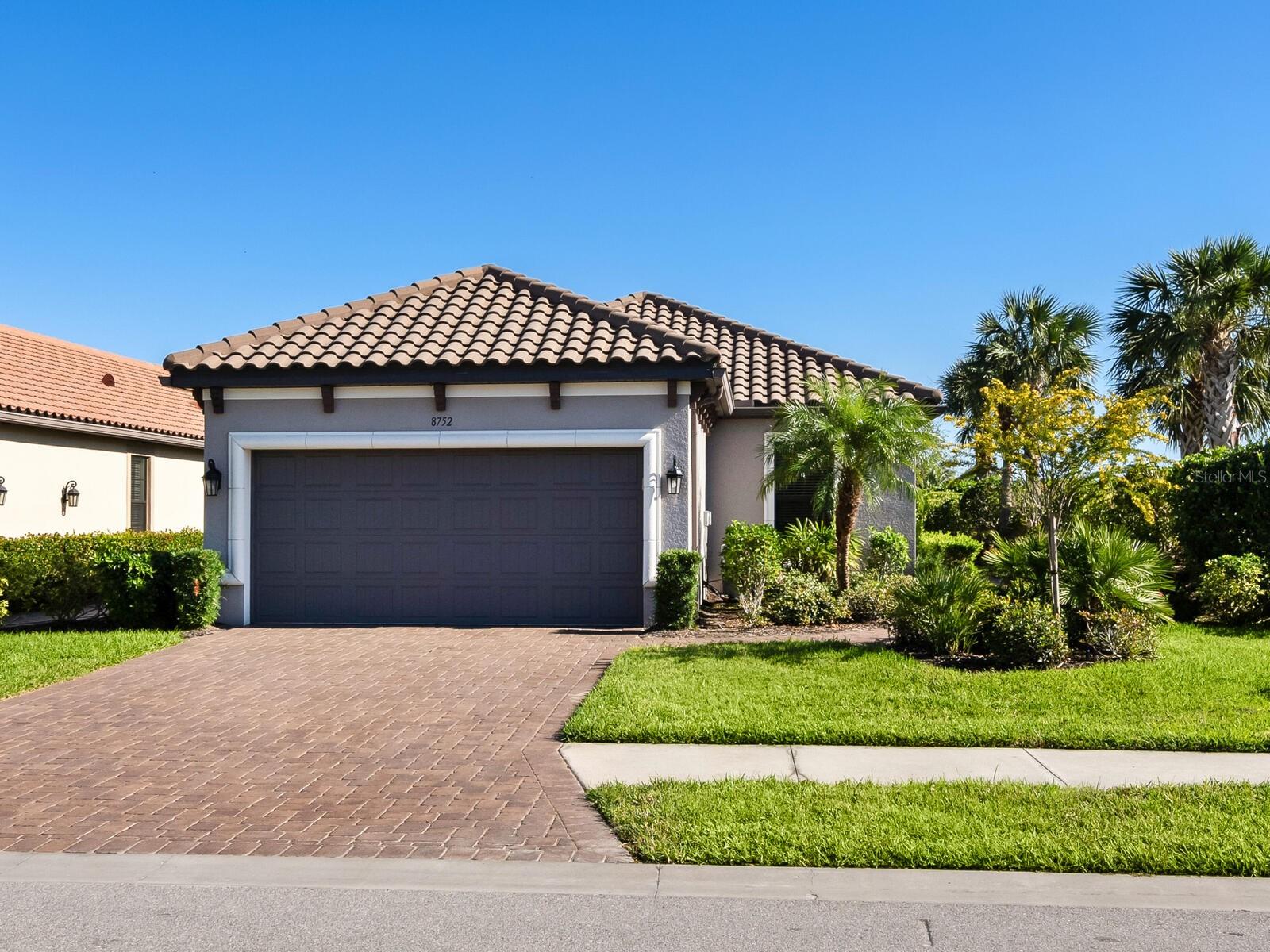 Annual unfurnished single-family home available for lease in Cobblestone on Palmer Ranch! Built in 2016, this beautifully appointed two-bedroom, two-bath single-story home offers 1,697 square feet of light-filled space with a versatile den, hardwood floors, crown molding and tray ceilings. The open-concept great room flows into a chef’s kitchen with wood cabinetry, stone countertops, stainless steel appliances, a backsplash and a breakfast bar. The primary suite features a bay window, walk-in closet and spa-like bath with dual vanities and a walk-in shower. A split-bedroom layout ensures privacy for the guest bedroom and bath. The den is ideal for a home office or extra sleeping space. Enjoy the screened lanai with garden views, ideal for relaxing or entertaining. Community amenities include a resort-style pool, fitness center, pickleball/bocce courts, and dog park. The home is near Legacy Trail, top schools, Siesta Key beaches, shopping, dining and more.