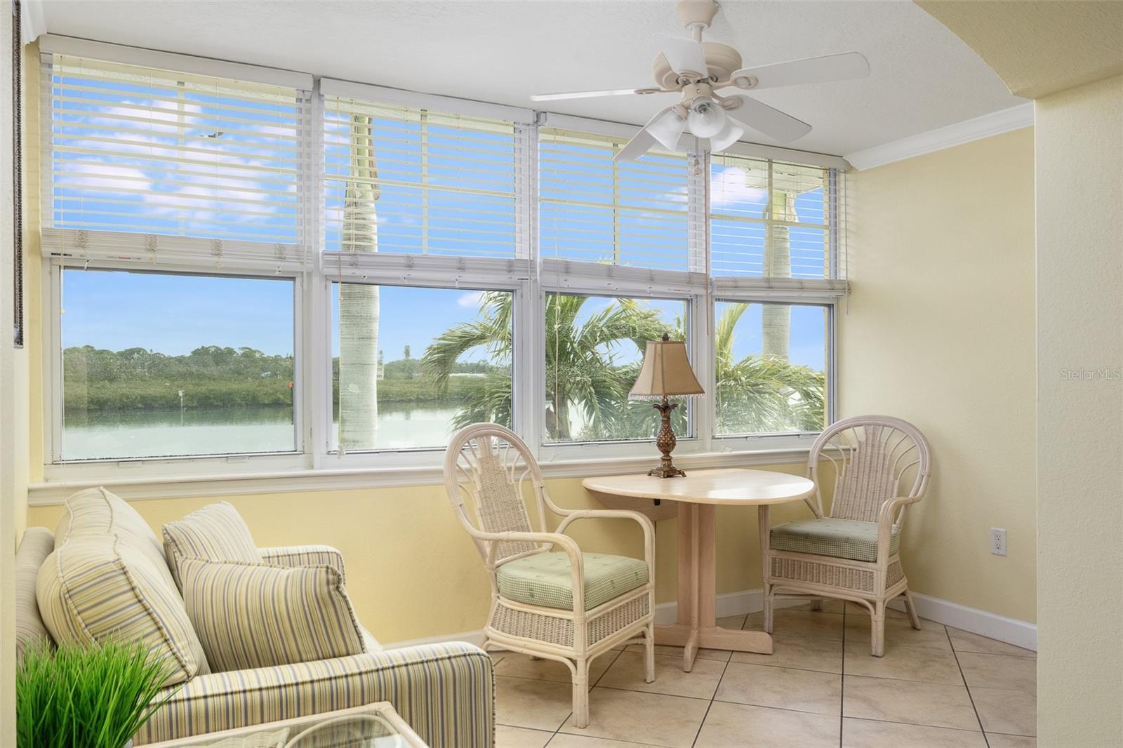 Imagine looking out your condo window and watching the dolphins playing in your new condo on the Intracoastal at Barefoot Beach. New bedroom floors and beautiful granite counter tops. Close to one of the many BBQs and tables. Docks for fishing or just watching the boats go by. This condo can be homesteaded for your primary residence with tropical landscaping. Enjoy the Sunsets on the Gulf beaches just across the street from your condo. This is a 1 to 7 day rental with an excellent rental history. This condo has a long term dock lease with a boat lift. Call agent for the price.