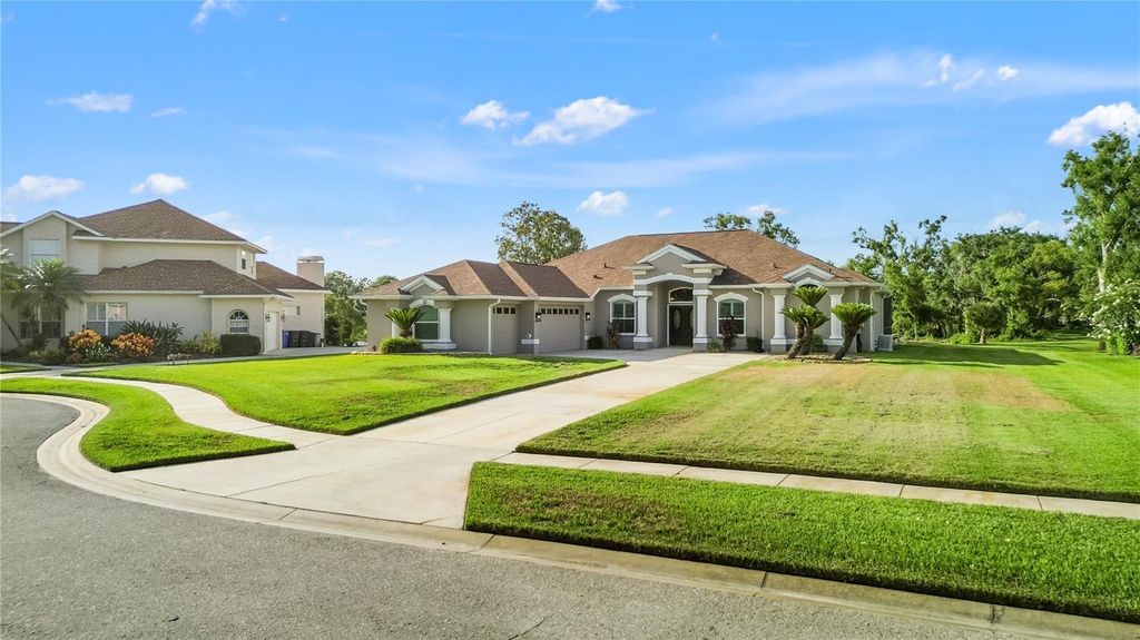 Photo of 1313 Oxbridge Drive, Lutz, FL 33549 (MLS # TB8395479)