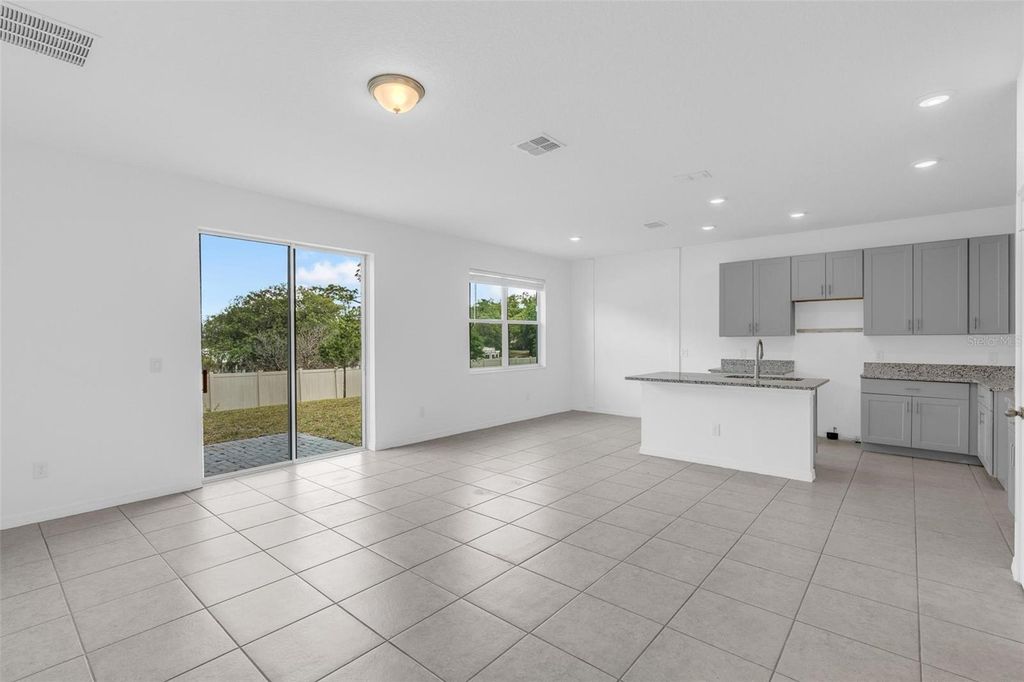 Photo of 663 Fairview Avenue, Haines City, FL 33844 (MLS # O6402618)