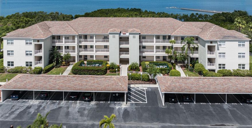 Furnished first floor unit at the Estuaries!  Beautifully updated and maintained unit ready for you to move in. Newer stainless appliances.   Two bedroom, split plan with bathrooms for each bedroom and a large living/dining area for entertaining.  The unit includes a beautifully outfitted lanai that opens to the preserve area.  The complex sits on the bay and features walking paths and a community fishing pier.  This unit also has a covered parking space.  The complex has recently been re-roofed and undergoing a fresh coat of paint.