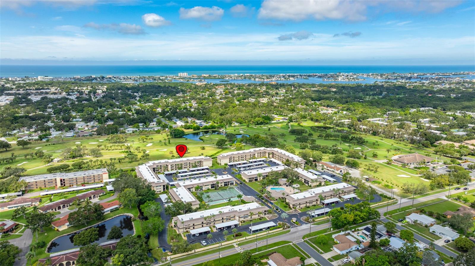Welcome to Villas de Golf, a community where retirement living meets relaxation right beside the scenic Largo Executive Golf Course. Just two miles from the sugar-sand shores of Indian Rocks Beach, this vibrant 55+ community blends leisure with recreation in the best Florida fashion.
This first-floor 2-bedroom, 2-bathroom condo offers over 1,000 sq. ft. of comfortable living, with a carport just steps from the front door. Pride of ownership is clear throughout this well-maintained home. The kitchen features a spacious passthrough to the dining and living room, making entertaining effortless. An enclosed sunroom overlooks the picturesque fairway, with lush shrubbery adding extra privacy. The owner’s suite enjoys direct access to the sunroom, a walk-in closet, and its own ensuite bath. With a split bedroom design, the second bedroom also has a private ensuite—ideal for hosting guests.
At Villas de Golf, every day feels like a getaway. Residents enjoy a wealth of amenities, including a heated pool, tennis, pickleball, and shuffleboard courts, plus two clubhouses—one with billiards, TVs, and gathering spaces, and another with a banquet hall and full kitchen for events. HOA fees cover water, sewer, trash, exterior maintenance, cable TV, and internet, allowing for stress-free living. For added flexibility, rentals are permitted after one year of ownership with a minimum six-month lease. (Sorry, no pets.)
The location is unbeatable—close to the SW Largo Recreation Center, grocery stores, shopping, restaurants, Tampa Bay sporting events, airports, bus stops, and the beautiful Florida Botanical Gardens.
Embrace maintenance-free living at Villas de Golf—bring your clubs, settle in, and enjoy the ultimate retirement lifestyle!