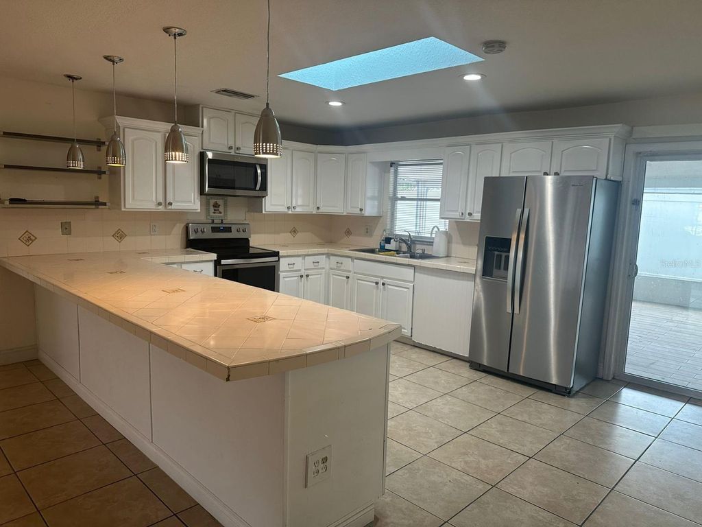 Photo of 144 Alameda Drive, Kissimmee, FL 34743 (MLS # S5136032)