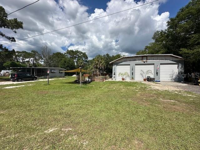 Live, Work & Create - Unique Crystal River Property with Home + Massive Workshop! A one of a kind opportunity combining comfortable living with serious space for work, hobbies, or business! Situated on a spacious lot, this property features a 3-bedroom, 2-bathroom mobile home with 1,288 sq ft of living space, a covered front patio, and a backyard storage shed perfect for everyday living or rental income. But the real showstopper is the 1,584 sq ft warehouse with three oversized garage bays, ideal for vehicles, equipment, workshop space, or storage. Inside the warehouse, you'll also find a studio apartment with a mini-split A/C system, plus a dedicated office suite—making it the perfect setup for a home-based business, creative studio, or private guest quarters. Whether you're an investor, business owner, hobbyist, or just looking for versatile space, this property delivers exceptional value and flexibility in one package. Don't miss this rare blend of residential comfort and functional workspace—schedule your showing today! **The property is occupied, approved showings only please**