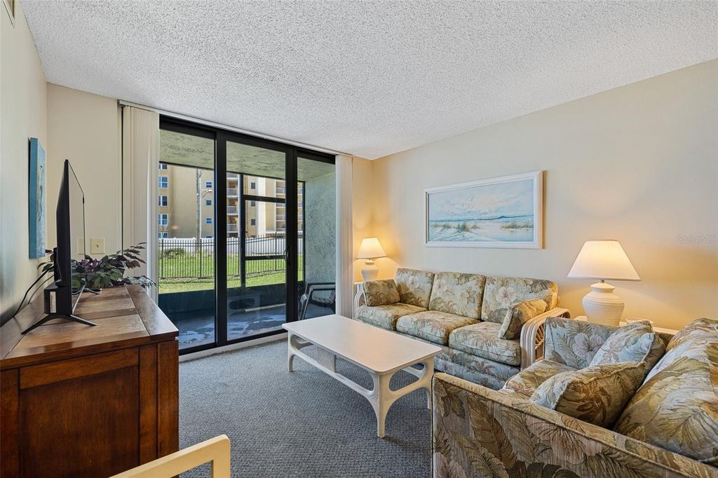 Photo of 3405 S Atlantic Avenue #101, New Smyrna Beach, FL 32169 (MLS # NS1087932)