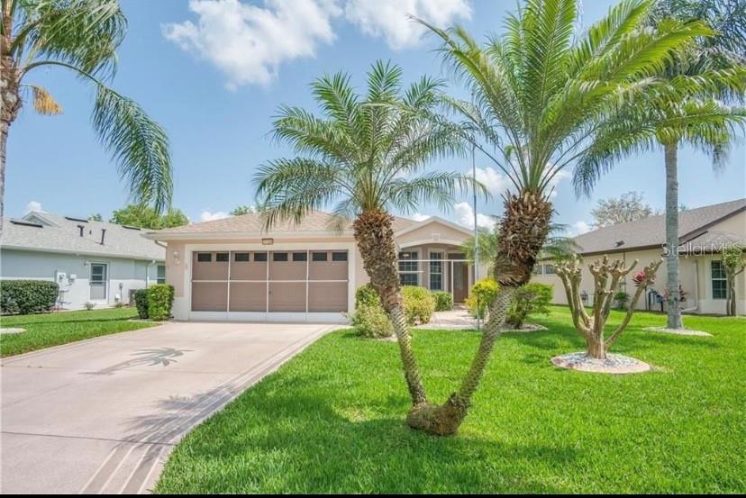 Photo of 27326 Orchid Glade Street, Leesburg, FL 34748 (MLS # O6405542)
