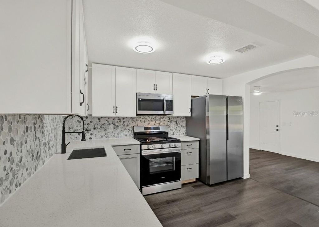 Photo of 1955 Gilbert Street, Clearwater, FL 33765 (MLS # TB8458896)